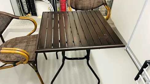 Outdoor bistro table - compact metal slatted square table