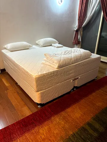 Queen mattress and divan base set in good condition