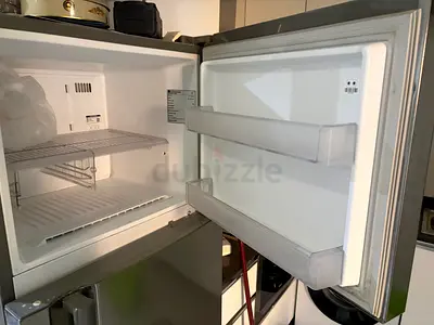 Used single-door refrigerator with freezer compartment – good working condition