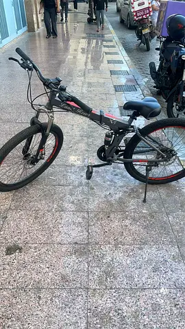 Used adult mountain bike - 26 frame, rear suspension, good condition , almost new.