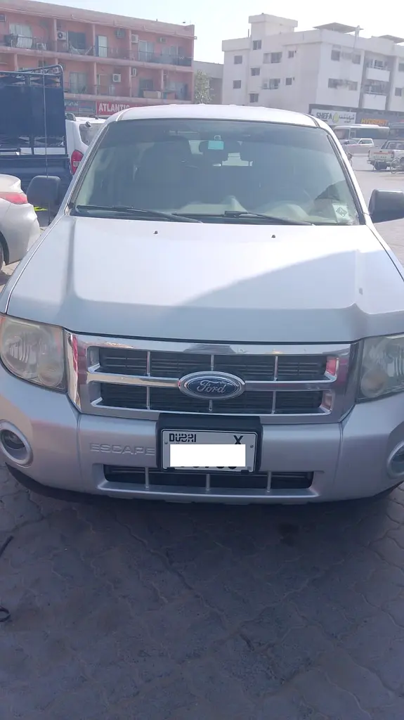 Ford Escape 2009 — photo 1 of 4