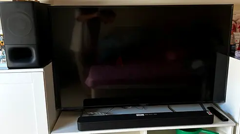 Sony 55-inch 4k Smart TV with soundbar and subwoofer