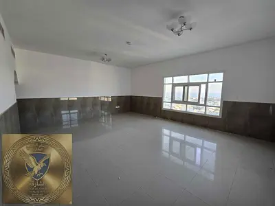 Two bedroom apartment for annual rent in Al Bu Tina Free parking huge layout sea view super deluxe finishing prime location