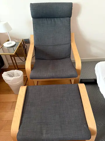 IKEA Poäng armchair with footstool - light wood frame, dark grey cushions