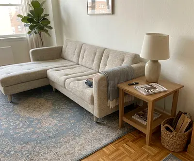 Luxury L-shaped sofa featuring premium fabric, thick cushions, and a strong wooden frame. Ideal for