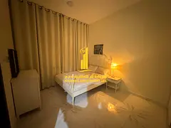 Furnished 2-bedroom apartment for monthly rent in Ajman, including utilities, internet, and parking.