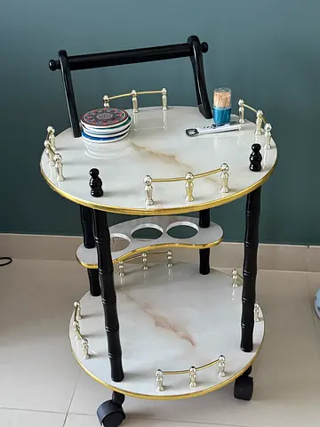 Vintage-style marble top serving trolley on wheels