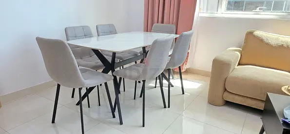 6-Seater Marble-Top Dining Table with Upholstered Grey Chairs