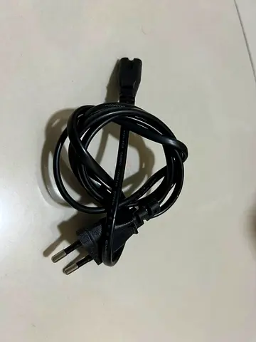 Used EU 2-pin to IEC C7 Power Cable (Laptop/Charger TV Cable)