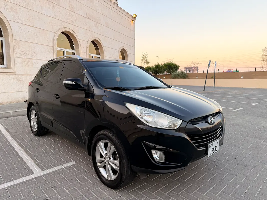 Hyundai Tucson 2011 — photo 1 of 13