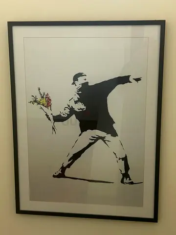 Framed Banksy-style Flower Thrower Print (Black Frame)