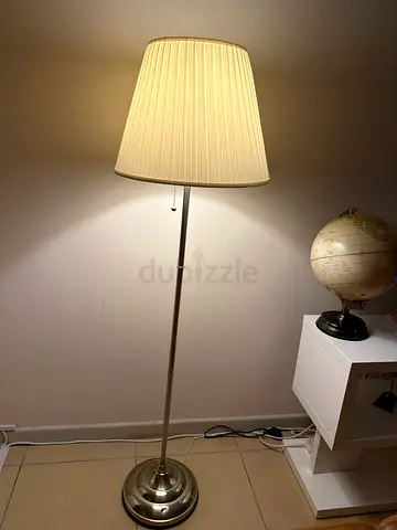 Tall floor lamp with pleated fabric shade
