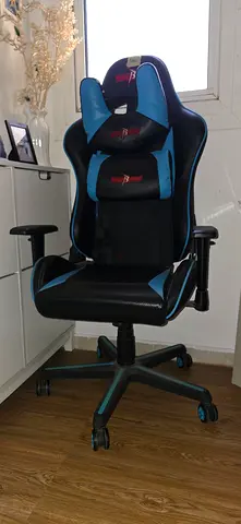 Blue and black gaming/office chair with lumbar support