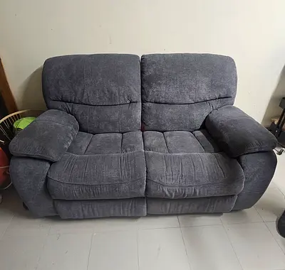 Comfortable 2-seater reclining sofa in grey fabric