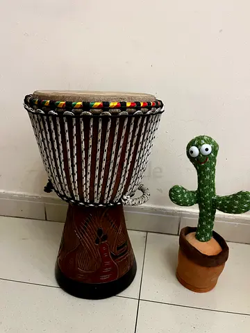 Hand-carved djembe drum - good condition.