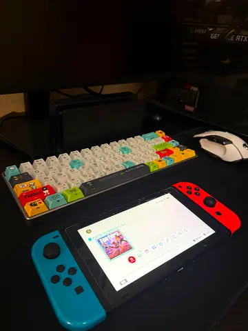 Nintendo Switch console with Joy-Con (Neon Red/Blue) - Good condition