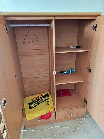 Light wood two-door wardrobe / armoire - good condition