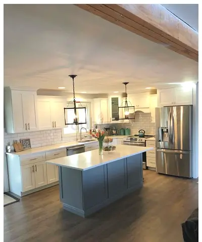 Modern kitchen island with white cabinetry and quartz countertop