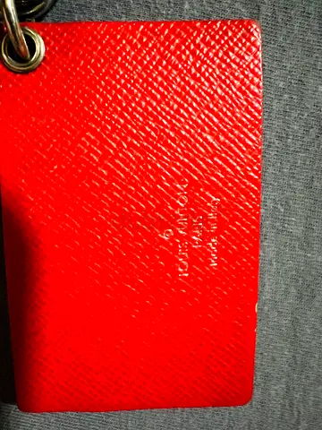 Red leather key card holder / luggage tag with metal ring