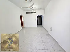 Two bedroom apartment with living room balcony open view spacious area free gym and pool free mainte