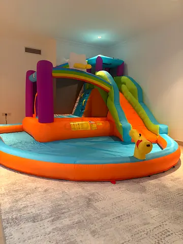 Inflatable Bouncy Castle with Slide and Splash Pool - Good Condition