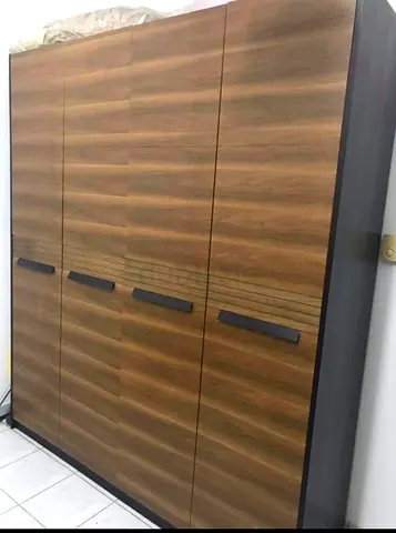 Modern 4-Door Wooden Wardrobe -solid wood Good Condition  CONTACT NUMBER 0507526607