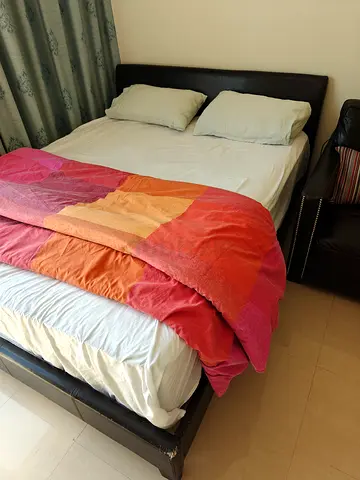 Queen leather-look bed frame with headboard - average condition. Very good matress.
