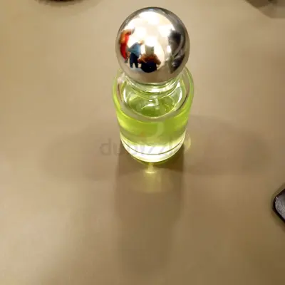 Small green perfume bottle man,s fragrance) - 50ml approx
