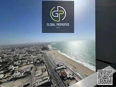 Distress Deal: Vacant 1BHK in Corniche Tower Ajman | 2 Baths, 1336 Sq Ft | Partial Sea View | Cash Only