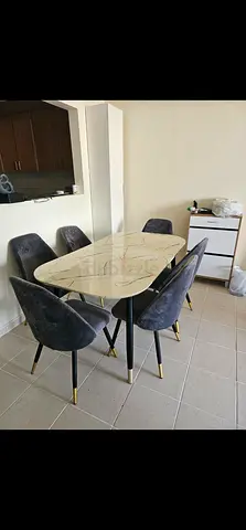 6-seater marble-top dining table with velvet chairs (used)