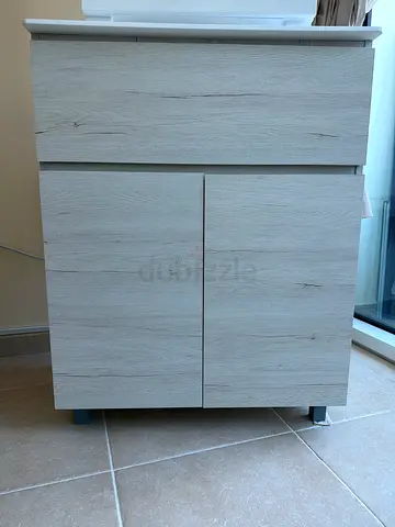 Light wood cabinet with ample storage