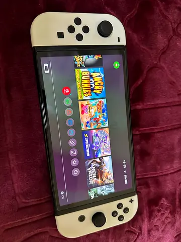 Nintendo Switch OLED with White Joy-Cons — Good Condition, Ready to Play
