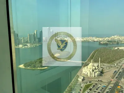 تكييف مجاني وباركن مجاني غرفتين وصالة مع بلكونة بإطلالة رائعة على كورنيش الخان وبحيرة خالد جيم ومسبح مجاني تاور عائلي بموقع مميز قريب من مخرج دبي