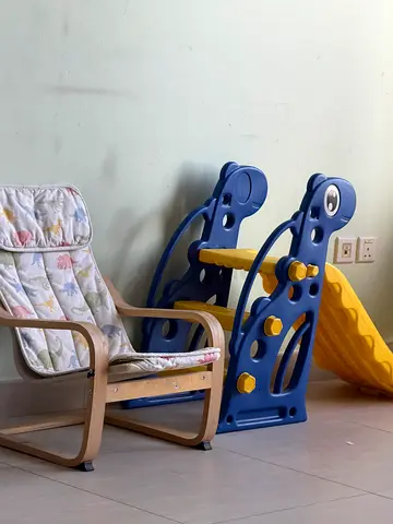 Wooden baby rocker with padded seat - gently used with slide