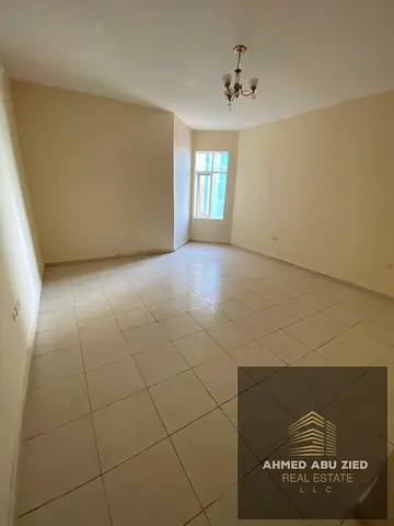 A beautiful, high-end apartment featuring a bedroom, a living room, and a balcony with an open view