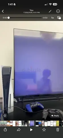 55-inch Smart LED TV in good condition (with PS5 shown)