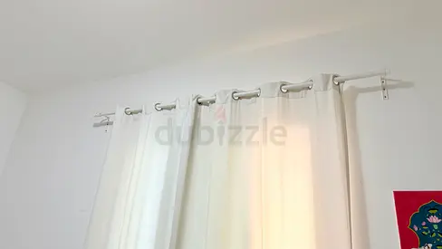White eyelet curtains with curtain rod – pair, gently used