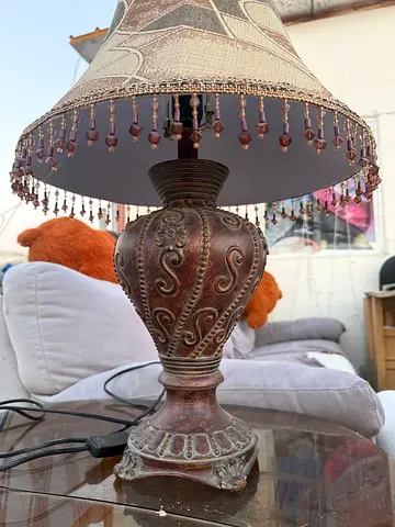 Decorative vintage-style table lamp with beaded shade