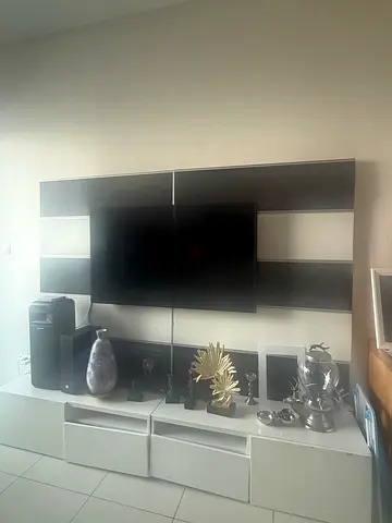 TV mounted on wall unit – Good working condition