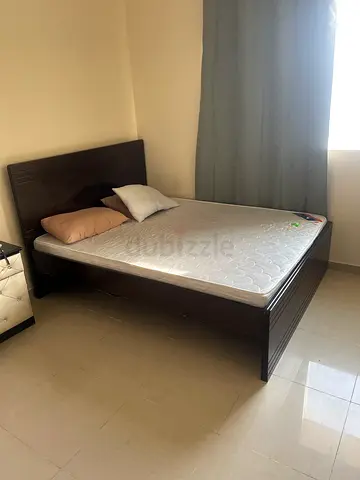 Wooden double bed frame with mattress - good condition