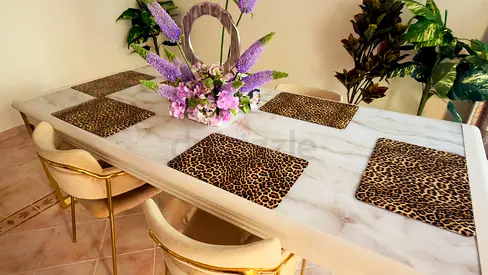 Modern Marble Top Dining Table with Gold Accent Chairs