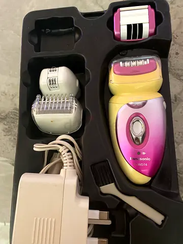 Epilator with multiple heads and charger - gently used