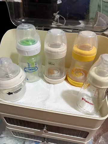 Assorted Baby Bottles, Breastfeeding Items, Nipples and Pacifiers