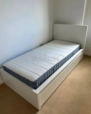Malam single  bed 90/200cm bed and Ikea mattress is available in excellent condition,