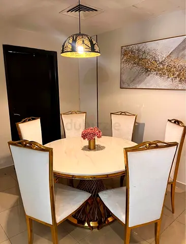 Round Marble-effect Dining Table with 6 Upholstered Gold Chairs - Excellent Condition