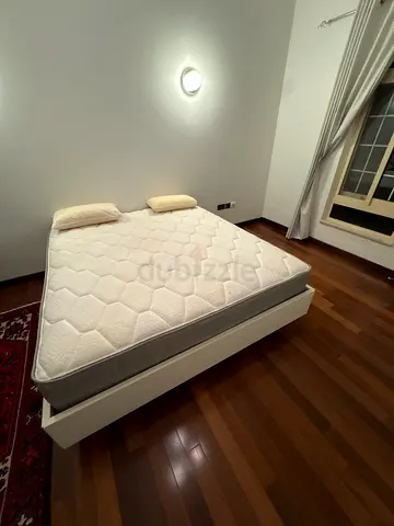 Queen size mattress with wooden bed frame - good condition