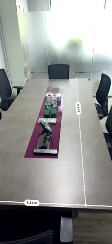 Conference table with built-in cable trough