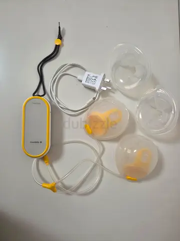 Electric Breast Pump with Spare Flanges and Charger - Excellent Condition- Barely Used