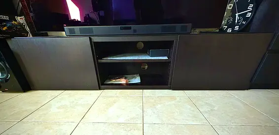 Glasstop TV entertainment unit with shelves and cabinets