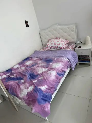 Girl’s single  white bed with and bedside table in good condition, including mattress